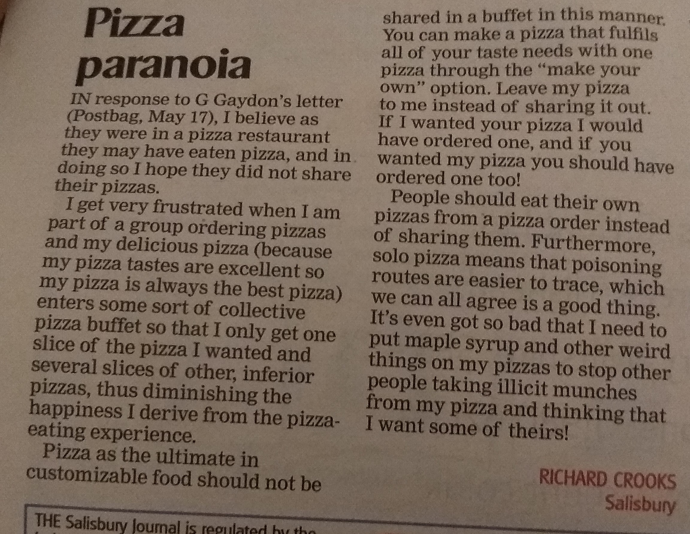 Photo of a letter in a newspaper about not sharing pizzas